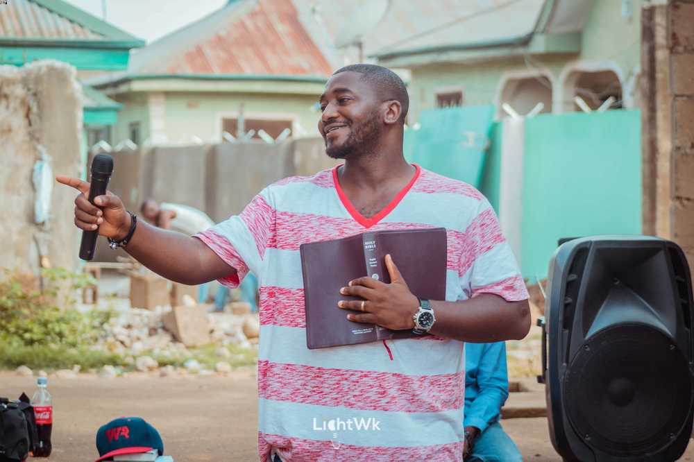 Spokesman with bible